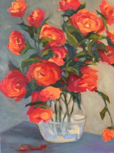 Red roses in clear vase